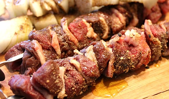 Elk sirloin skewers with onions