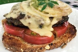 Open-Faced Pesto Cheeseburgers with Grilled Onions